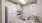 a kitchen with white cabinets