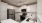 a kitchen with white cabinets