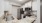a kitchen with white cabinets